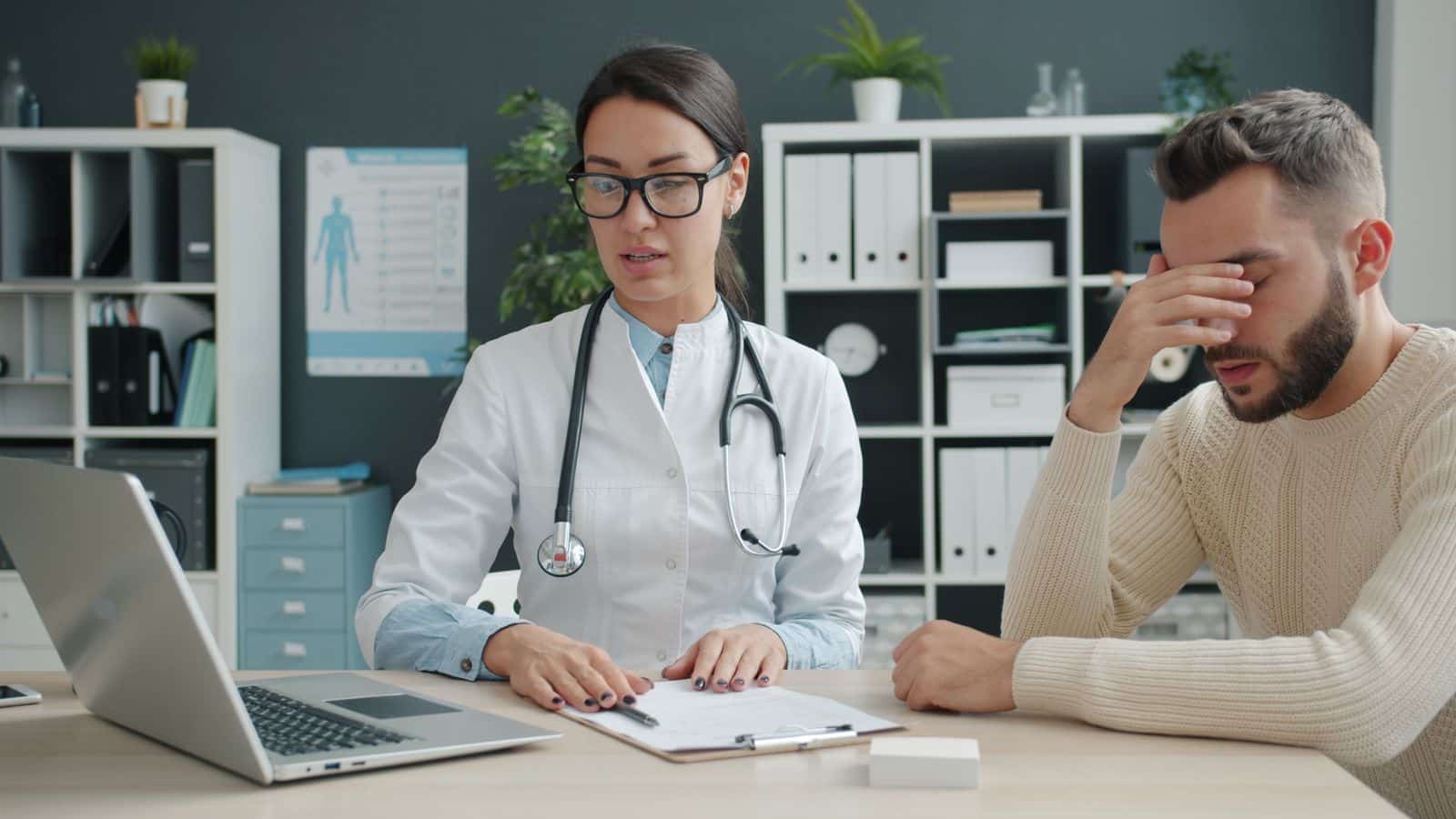 Male patient discussing a health concern with Male patient discussing a health concern with a primary care physician in Greenwich, CT